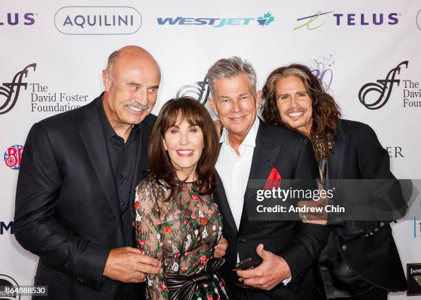 Dr. Phil McGraw, Robin McGraw, David Foster and Steven Tyler attend the David Foster Foundation Gala at Rogers Arena on October 21, 2017 in...