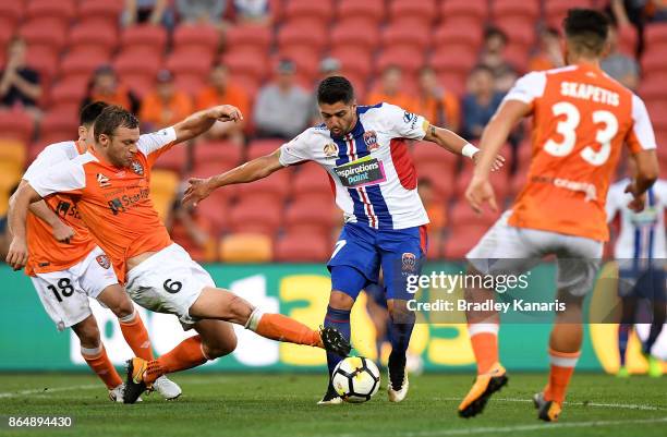 Dimitri Petratos of the Jets takes on the defence during the round three A-League match between the Brisbane Bullets and the Newcastle Jets at...