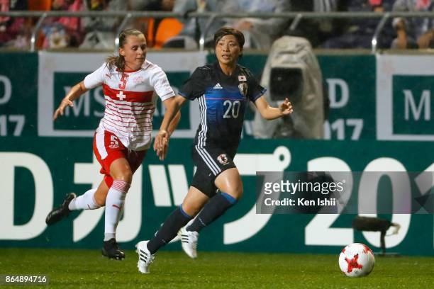 Miho Manya of Japan and Noelle Maritz of Switzerland compete for the ball during the international friendly match between Japan and Switzerland at...