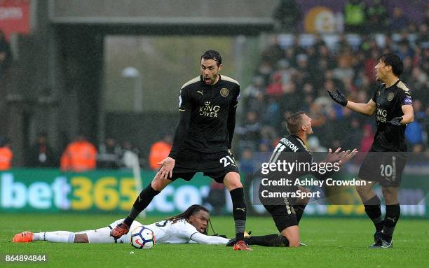 Leicester City's Vicente Iborra, Marc Albrighton and Shinji Okazaki react to a foul against Swansea City's Renato Sanches during the Premier League...