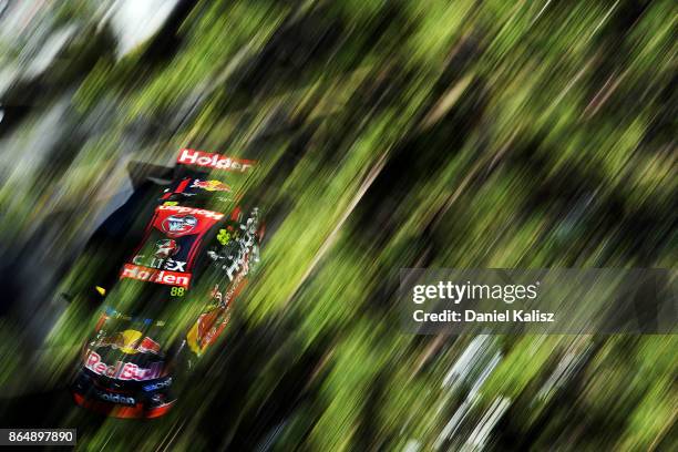 Jamie Whincup drives the Red Bull Holden Racing Team Holden Commodore VF during race 22 for the Gold Coast 600, which is part of the Supercars...