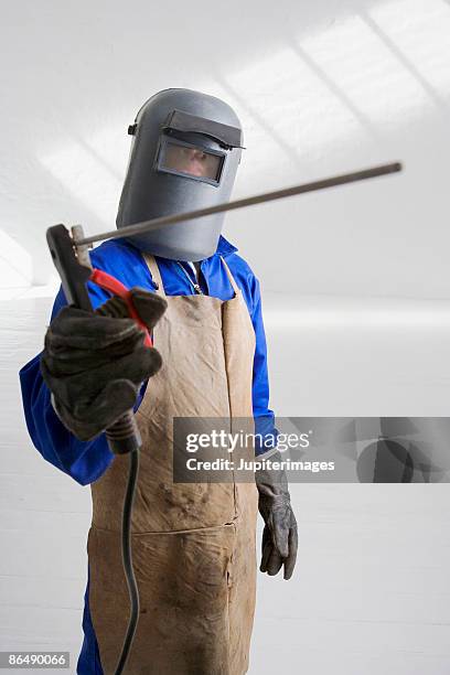 man in welding mask - sandblasting stock pictures, royalty-free photos & images