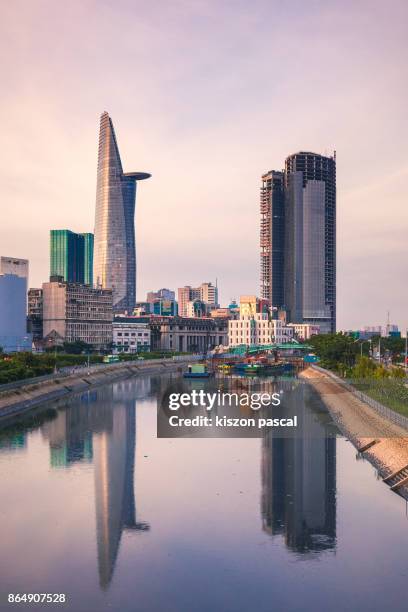 sunset in center of ho chi minh city in vietnam . . - modern vietnam stockfoto's en -beelden