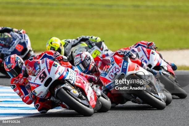 Karel Abraham of Czechoslovakia riding for Pull&Bear Aspar Team and Andrea Dovizioso of Italy riding for the Ducati Team are seen during the 2017...