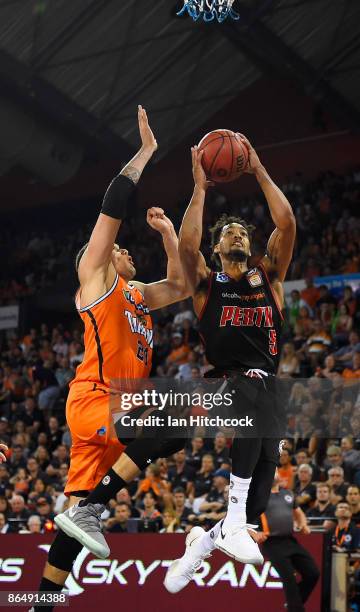 Jean-Pierre Tokoto of the Wildcats drives to the basket during the round three NBL match between the Cairns Taipans and the Perth Wildcats at Cairns...