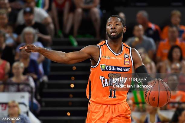 Scoochie Smith of the Taipans dribbles the ball during the round three NBL match between the Cairns Taipans and the Perth Wildcats at Cairns...