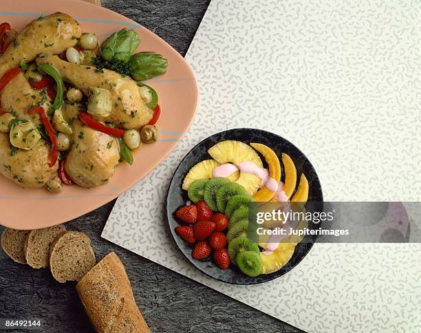herb chicken , artichoke and fruit - chicken with berry sauce stock pictures, royalty-free photos & images