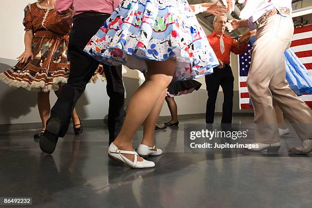 legs of couples square dancing - square dancing stock pictures, royalty-free photos & images