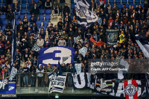 Bordeaux's fans cheer during the French L1 football match between Amiens and Bordeaux on October 21 at the Oceane stadium, in Le Havre, northwestern...