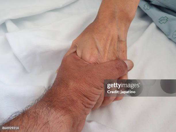 hand of consolation and love of the sick - streptomyces stock pictures, royalty-free photos & images