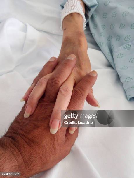 hand of consolation and love of the sick - streptomyces stock pictures, royalty-free photos & images