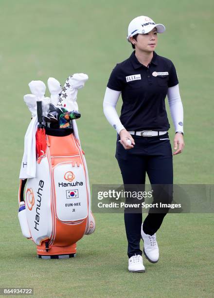 Eun-Hee Ji of South Korea walks next to her bag on the fourth hole during the Swinging Skirts LPGA Taiwan Championship on October 22, 2017 in Taipei,...