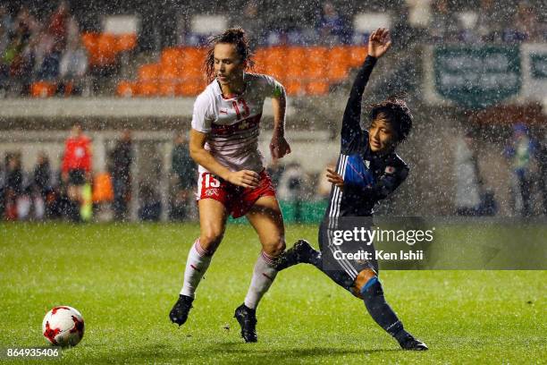 Mana Iwabuchi of Japan and Lia Walti of Switzerland compete for the ball during the international friendly match between Japan and Switzerland at...