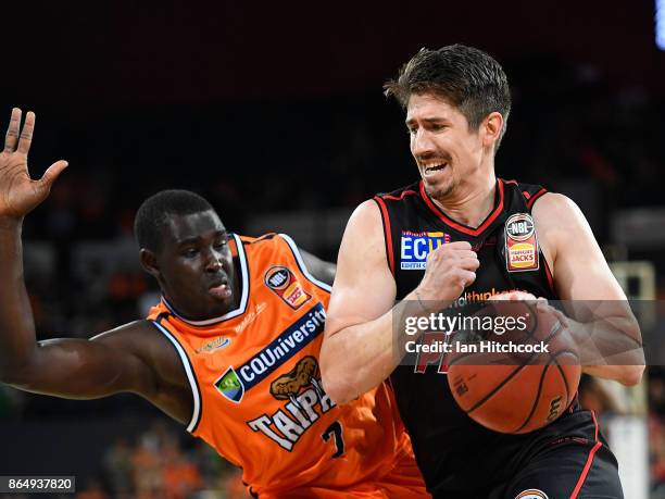 Greg Hire of the Wildcats drives to the basket during the round three NBL match between the Cairns Taipans and the Perth Wildcats at Cairns...