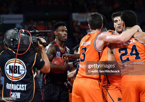Derek Cooke Jr of the Wildcats is involved in a scuffle with several Taipans players during the round three NBL match between the Cairns Taipans and...