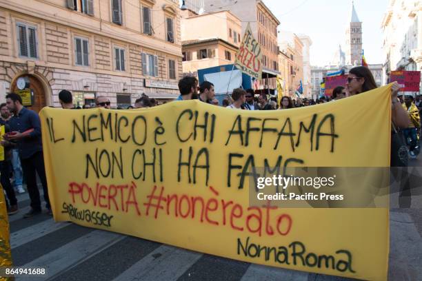 Demonstrators hold an anti-racism protest in the streets of Rome.