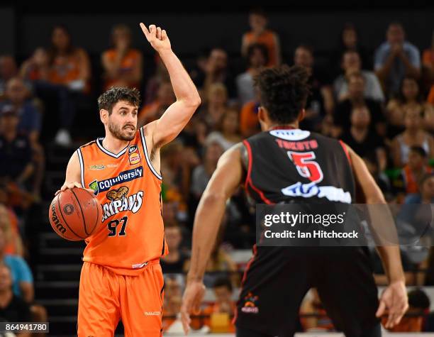 Jarrad Weeks of the Taipans signals during the round three NBL match between the Cairns Taipans and the Perth Wildcats at Cairns Convention Centre on...