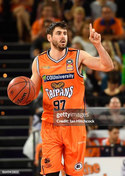 Jarrad Weeks of the Taipans signals during the round three NBL match between the Cairns Taipans and the Perth Wildcats at Cairns Convention Centre on...