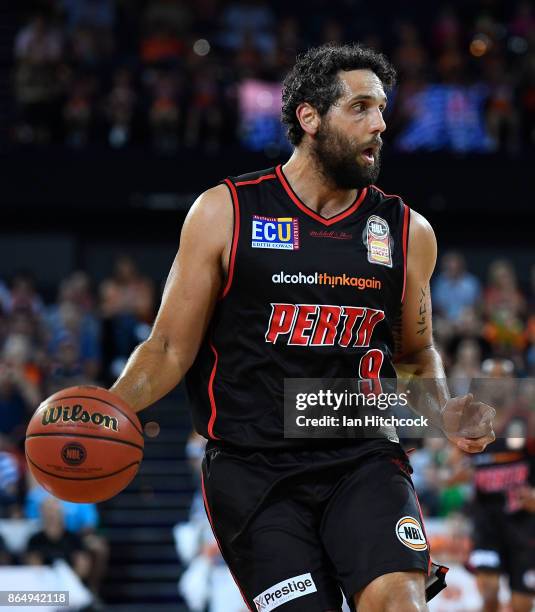 Matthew Knight of the Wildcats dribbles the ball during the round three NBL match between the Cairns Taipans and the Perth Wildcats at Cairns...