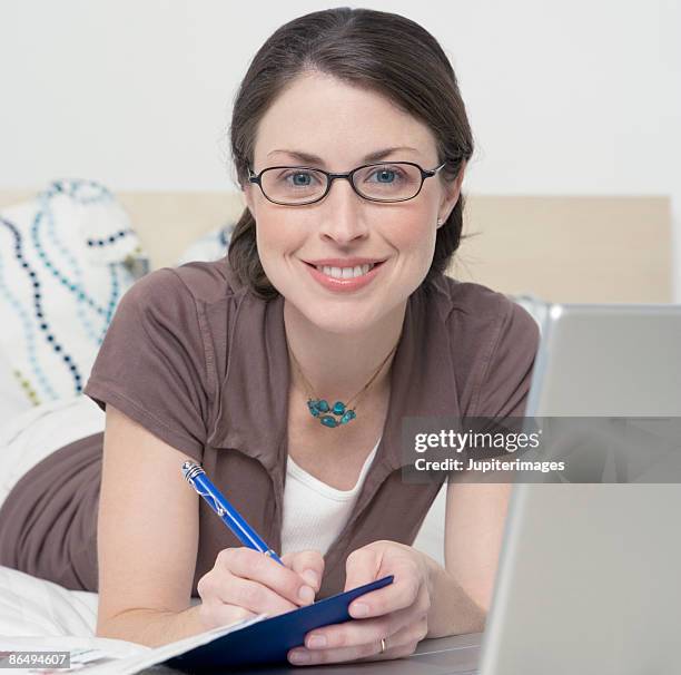 Woman Writecheck Woman Balancing Checkbook Photos and Premium High Res Pictures - Getty ...