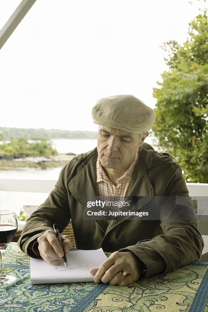 A Man Riting A Letter Man Writing A Letter High-Res Stock Photo - Getty Images