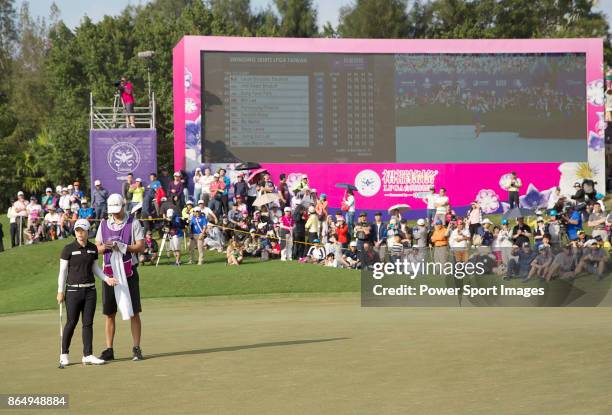 Eun-Hee Ji of South Korea waits to putt on the 18th fairway during the Swinging Skirts LPGA Taiwan Championship on October 22, 2017 in Taipei, Taiwan.