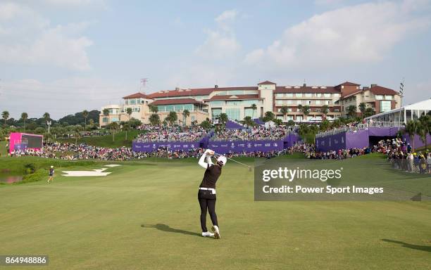 Eun-Hee Ji of South Korea lines hits a shot on the 18th fairway during the Swinging Skirts LPGA Taiwan Championship on October 22, 2017 in Taipei,...
