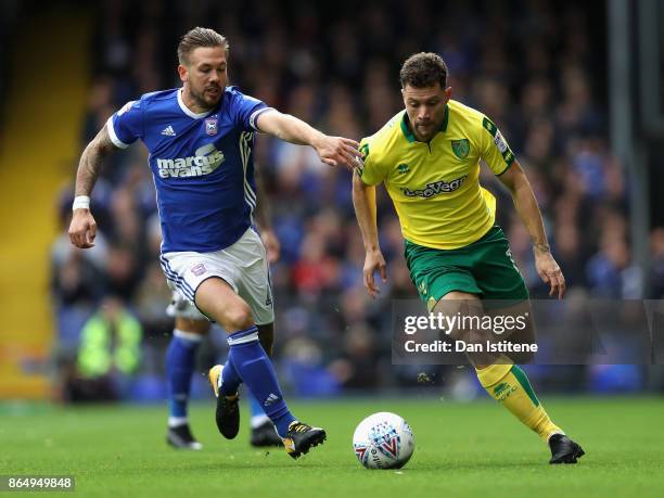 Luke Chambers of Ipswich and Yanic Wildschut of Norwich City battle for possession during the Sky Bet Championship match between Ipswich Town and...