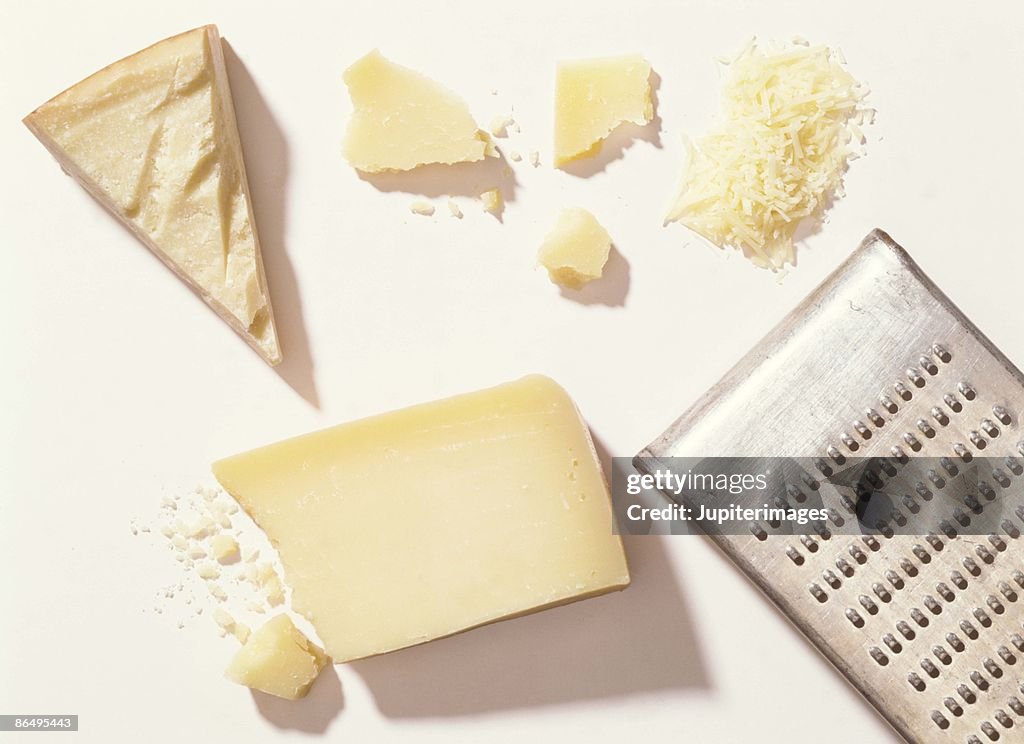 Parmesan cheese with grater