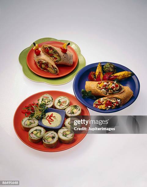assorted appetizers - sushi wrap stock pictures, royalty-free photos & images