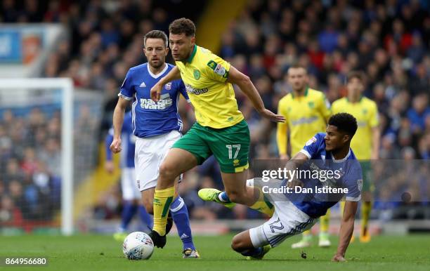 Yanic Wildschut of Norwich City escapes a challenge from Jordan Spence of Ipswich during the Sky Bet Championship match between Ipswich Town and...