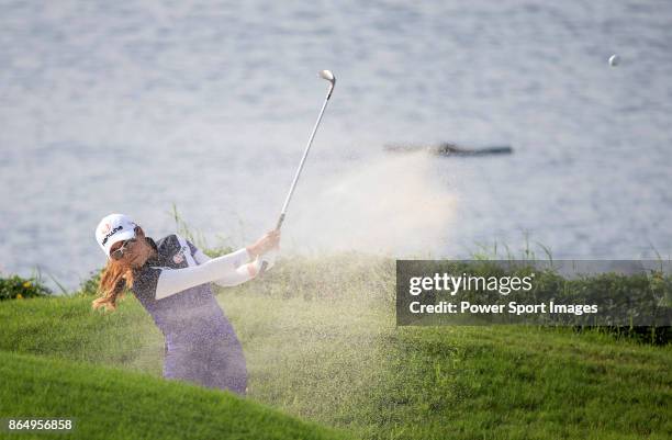 Jenny Shin of South Korea hits a shot out of the bunker on the 18th green during day four of Swinging Skirts LPGA Taiwan Championship on October 22,...