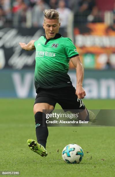 Matthias Ostrzolek of Hannover 96 kicks the ball during the Bundesliga match between FC Augsburg and Hannover 96 at WWK-Arena on October 21, 2017 in...