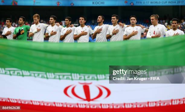 Iran players sing their national anthem during the FIFA U-17 World Cup India 2017 Quarter Final match between Spain and Iran at Jawaharlal Nehru...