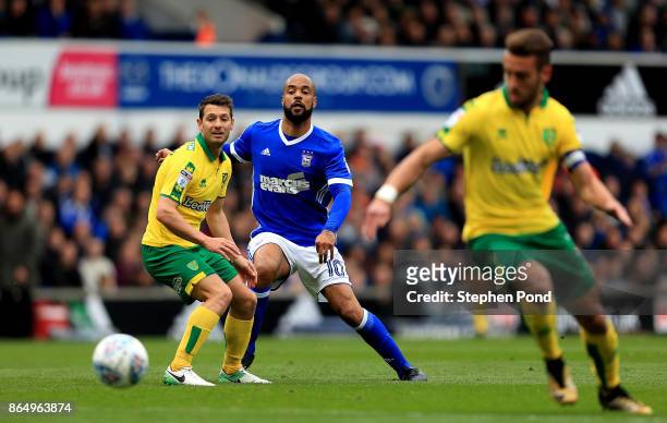 David McGoldrick of Ipswich Town and Wes Hoolahan of Norwich City compete for the ball during the Sky Bet Championship match between Ipswich Town and...