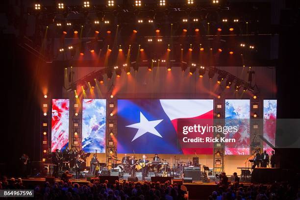 Lyle Lovett performs onstage during the 'Deep from the Heart: The One America Appeal Concert' at Reed Arena on the campus of Texas A&M University on...