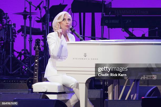 Lady Gaga performs onstage during the 'Deep from the Heart: The One America Appeal Concert' at Reed Arena on the campus of Texas A&M University on...