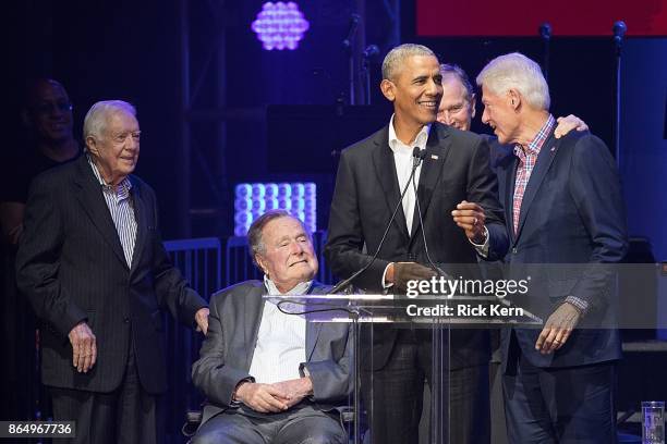 Former United States Presidents Jimmy Carter, George H.W. Bush, Barack Obama, George W. Bush, and Bill Clinton address the audience during the 'Deep...