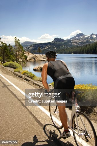 Man riding bicycle at Lake Tahoe, California, United States