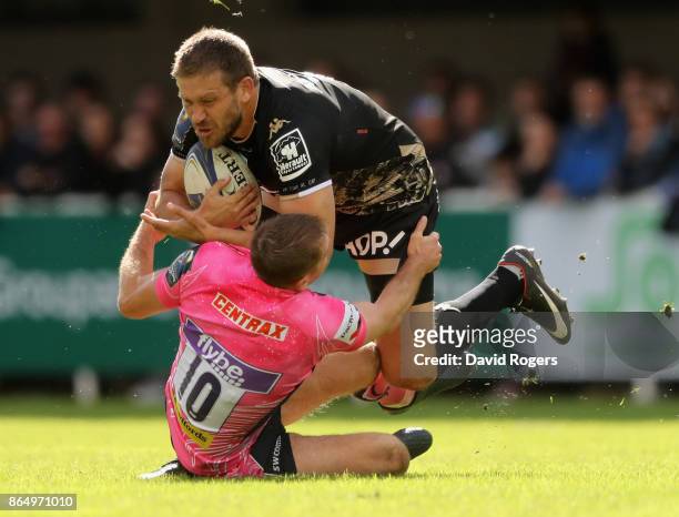 Francois Steyn of Montpellier is tackled by Gareth Steenson during the European Rugby Champions Cup match between Montpellier and Exeter Chiefs at...