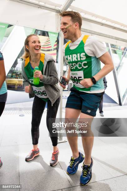 Emily Bowker and Chris Harper take part in the Gherkin Challenge for the NSPCC at The Gherkin on October 22, 2017 in London, England.