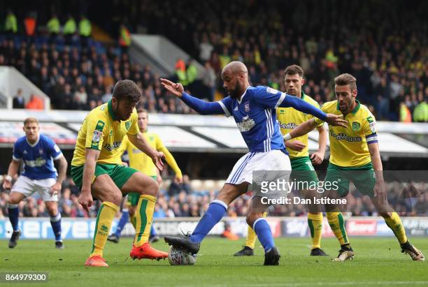 David McGoldrick of Ipswich and Grant Hanley of Norwich City battle for possession during the Sky Bet Championship match between Ipswich Town and...