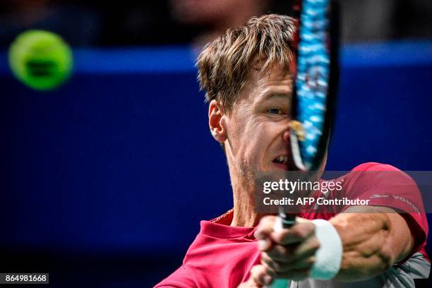 Lithuania's Ricardas Berankis hits a return to Bosnia-Herzegovina's Damir Dzumhur during the Kremlin Cup tennis tournament men's singles final match...