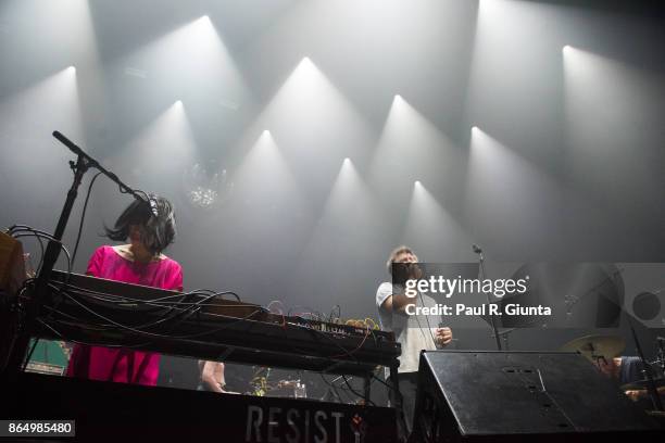 Nancy Whang and James Murphy of LCD Soundsystem perform on stage at the Coca-Cola Roxy on October 21, 2017 in Atlanta, Georgia.