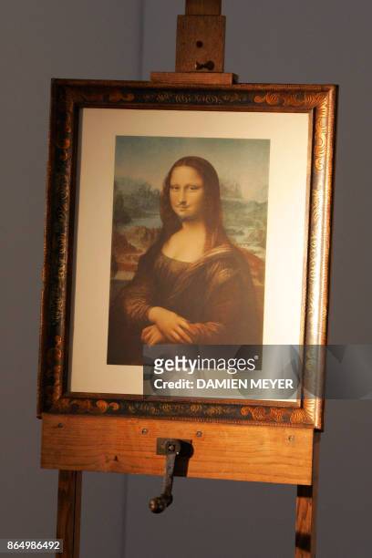 This file photo taken on June 2, 2005 shows "L.H.O.O.Q", a moustachioed Mona Lisa by dadaist painter Marcel Duchamp painted in 1930, displayed at the...