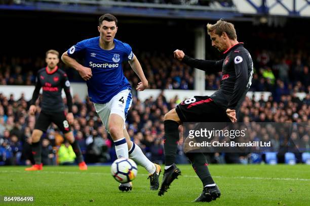 Nacho Montreal of Arsenal scores the equaliser during the Premier League match between Everton and Arsenal at Goodison Park on October 22, 2017 in...