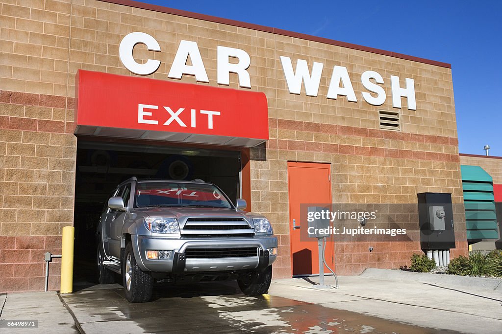 SUV exiting car wash