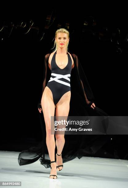 Model walks the runway at the Dorit Kemsley Preview Event For Beverly Beach By Dorit at The Trunk Club on October 21, 2017 in Culver City, California.