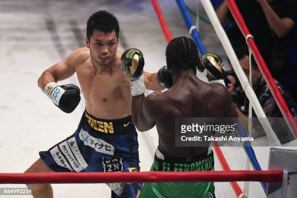 Ryota Murata of Japan punches Hassan N'Dam N'Jikam of France during their WBA Middleweight Title Bout at Ryogoku Kokugikan on October 22, 2017 in...