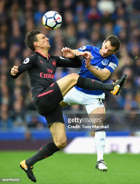 Laurent Koscielny of Arsenal and Leighton Baines of Everton battle for possession during the Premier League match between Everton and Arsenal at...